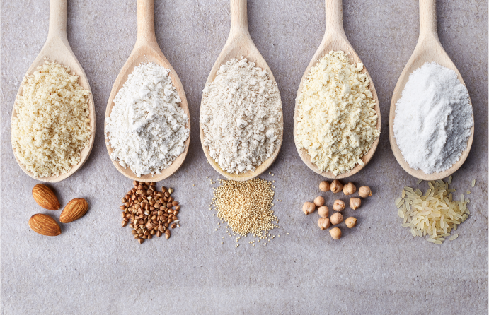 almond flour, buckwheat flour, amaranth flour, chickpea flour, and rice flour on spoon