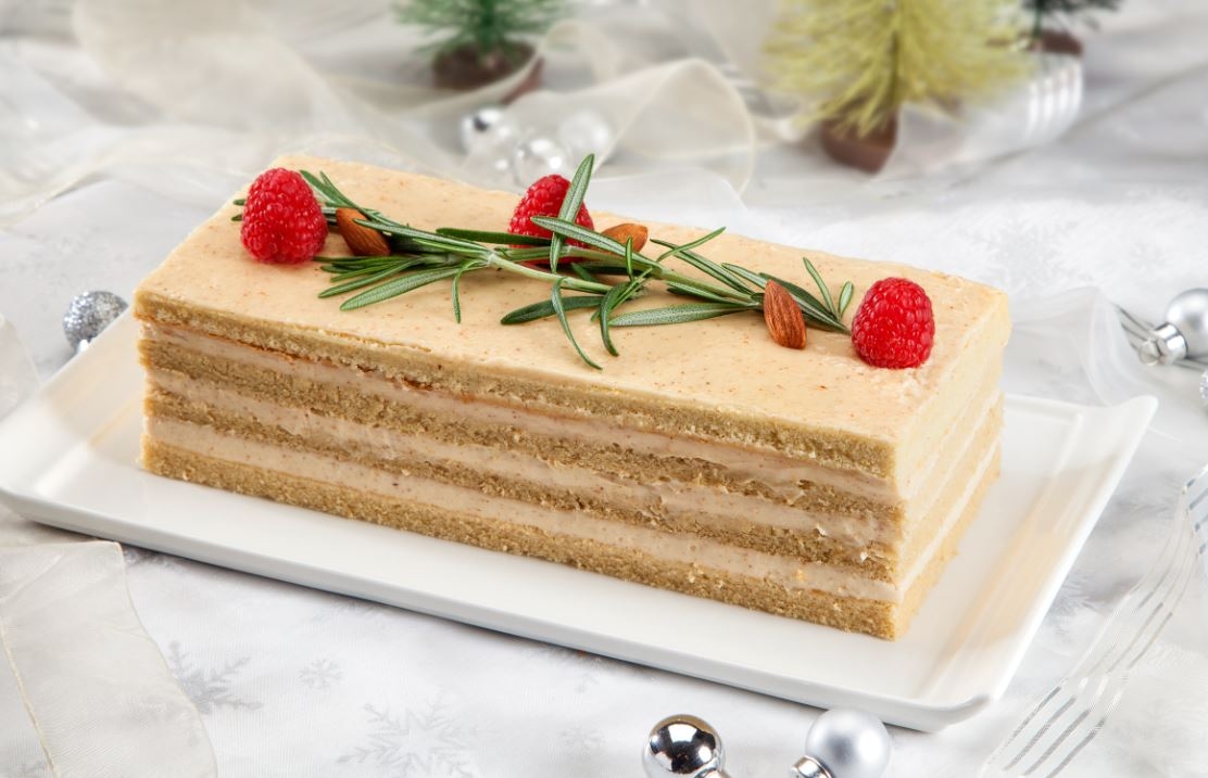 Vanilla cake almond swiss meringue buttercream and raspberry